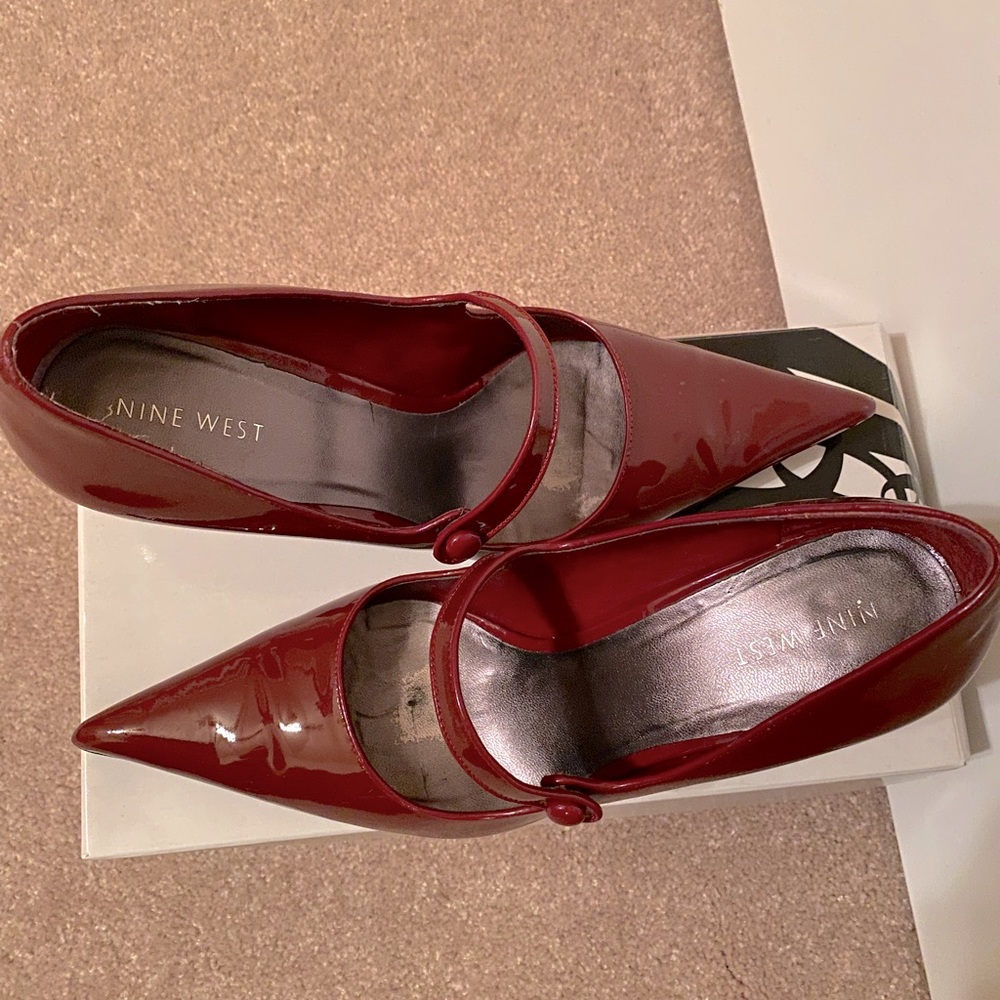 Size 8.5, Nine West, dark red patent leather, pointed Mary Jane style heels.